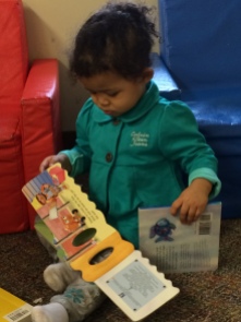 A Bright Beginnings toddler with a few books from the RX for Reading delivery